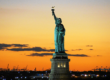 View of the statue of liberty at sunset, the Best Sunset Spot in NYC