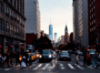 new york city street with skyline in the background