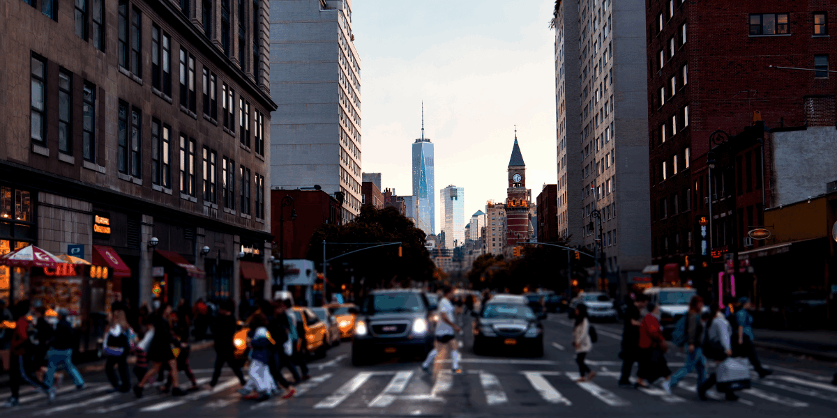 new york city street with skyline in the background