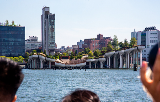 view of new york city's "little island" as seen from a boat cruise on the hudson river
